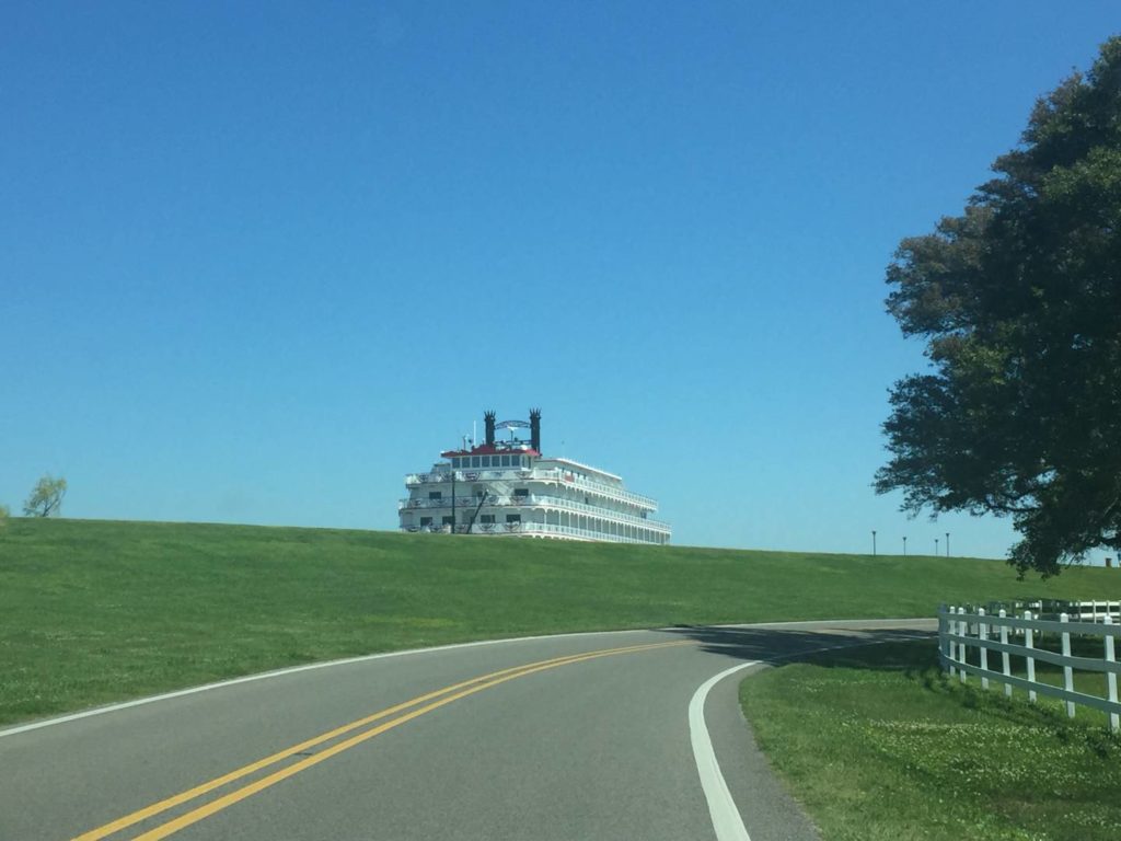 What to see in Louisiana: a steamboat comes out the Mississippi’s levee. Surprises of the River Road