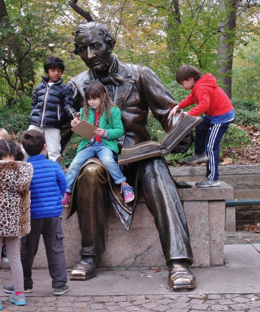 The Christian Andersen statue and its little fans